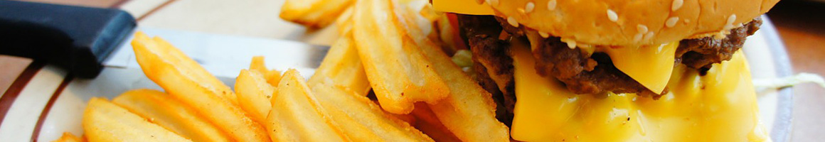 Eating Burger at Sparkles Burger & Daiquri restaurant in Houston, TX.
